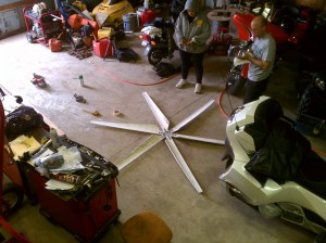 Wind turbine blades being attached to the hub